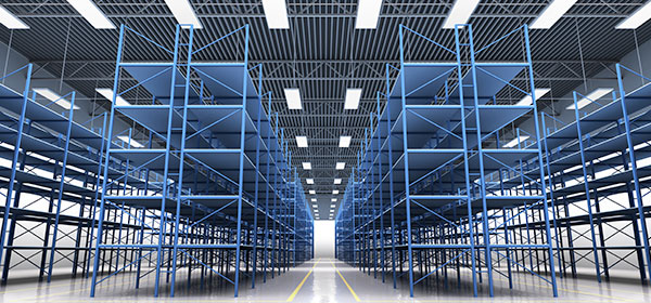 Empty warehouse with blue shelving